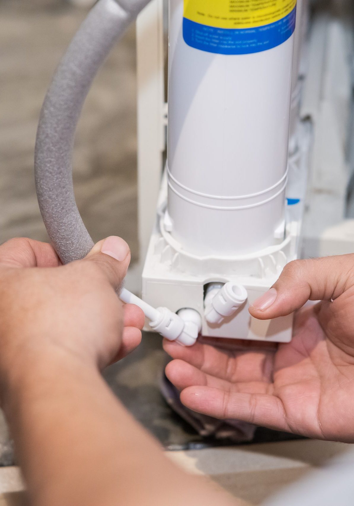 Kuala Lumpur, Malaysia - July 10, 2021 Changing water filter at home.